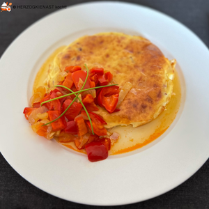 Jogurt Cake with bell pepper veggies served on a plate